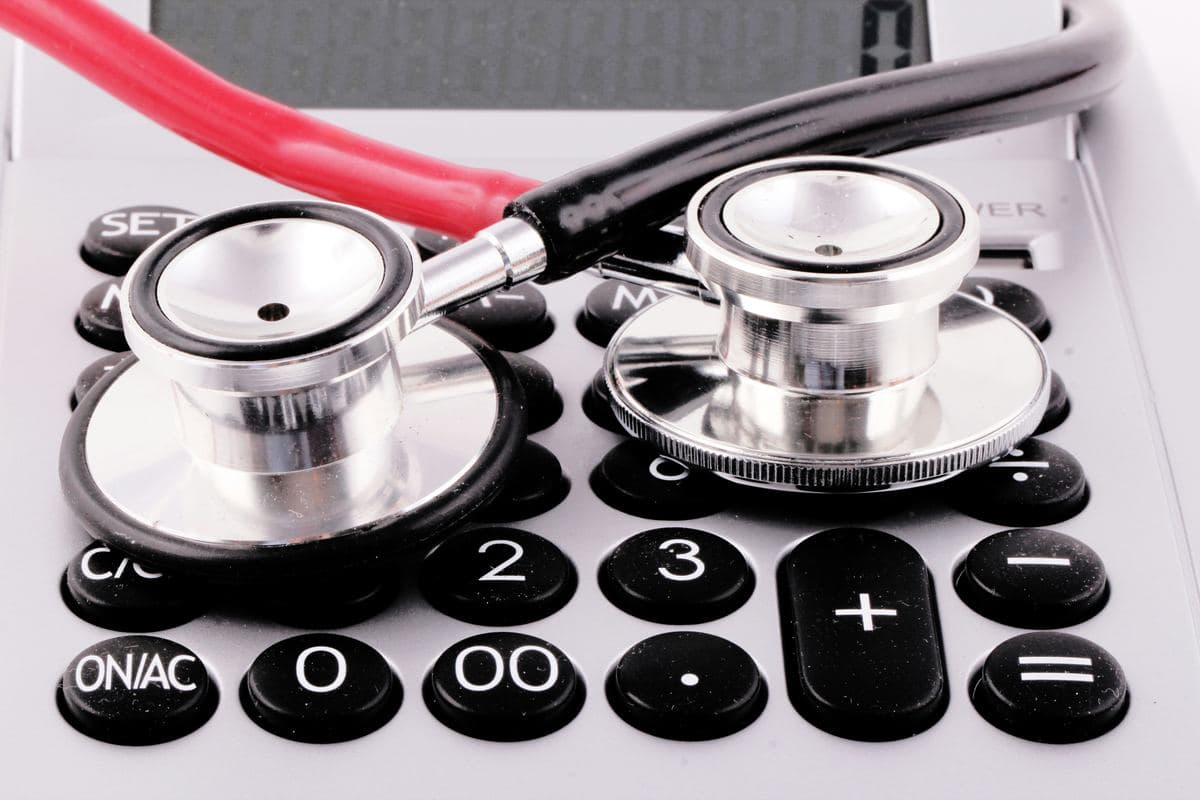 Revenue cycle specialists reviewing claim performance data